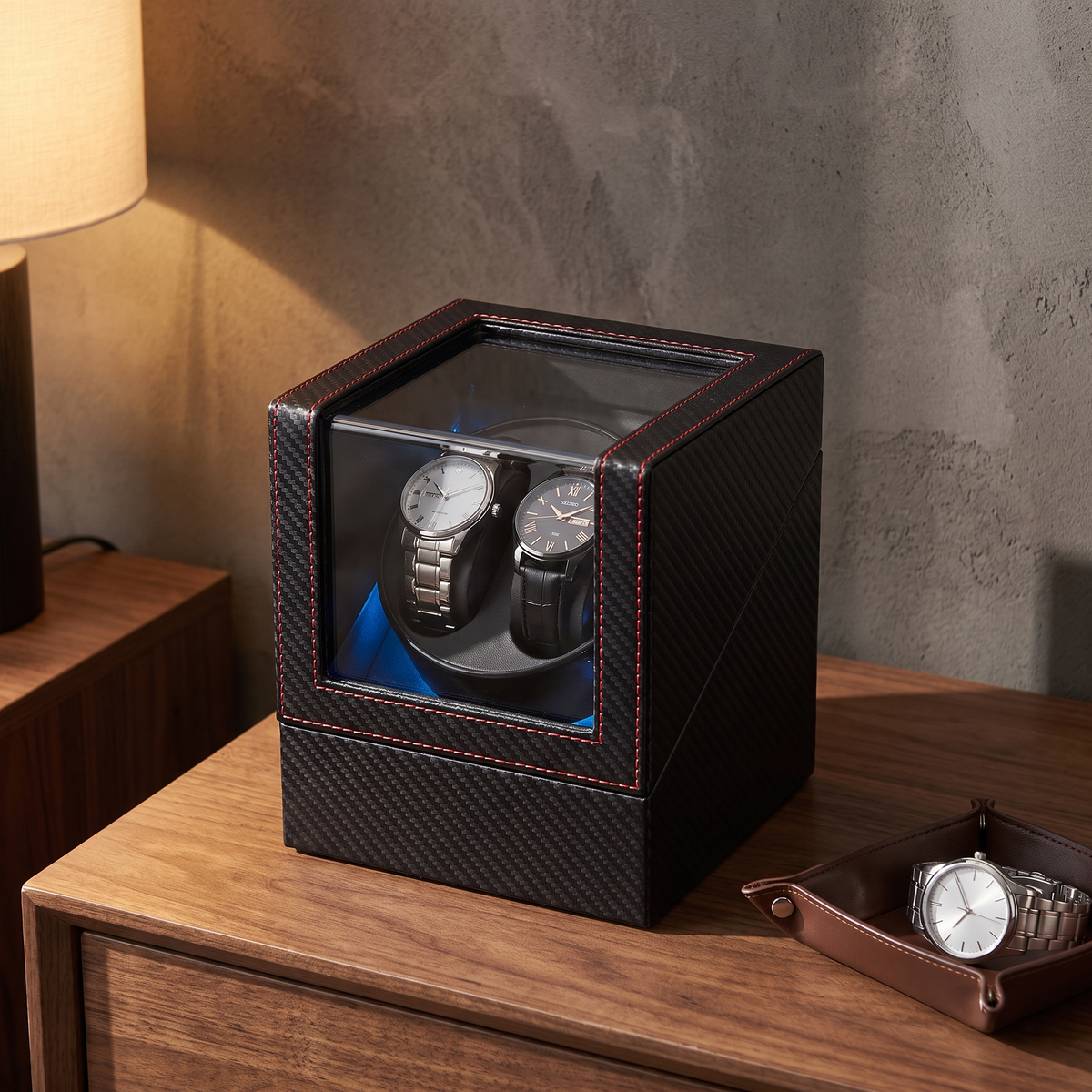 Watch Winder, Carbon Fibre, Rechargeable, on a nightstand